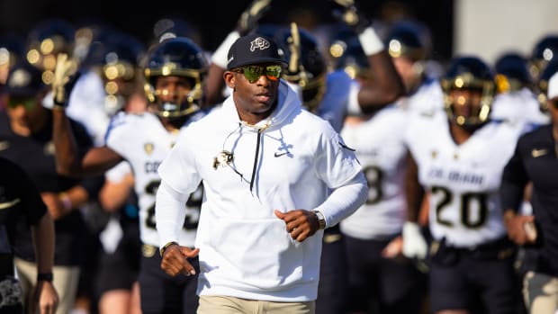 Colorado Buffaloes head coach Deion Sanders against the Arizona State Sun Devils at Mountain America Stadium